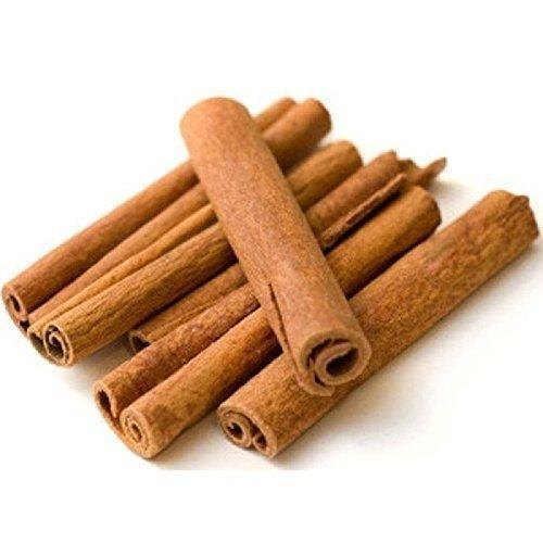 Bharvi Cinnamon (Dalchini) product packaging, showing whole curled cinnamon sticks and fine cinnamon powder.